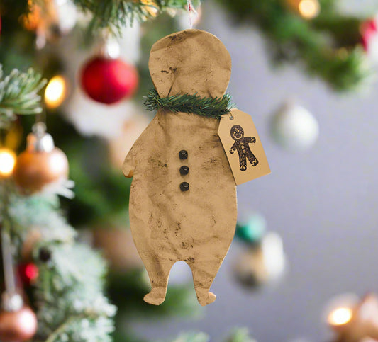 Primitive gingerbread man ornament with tag on white background