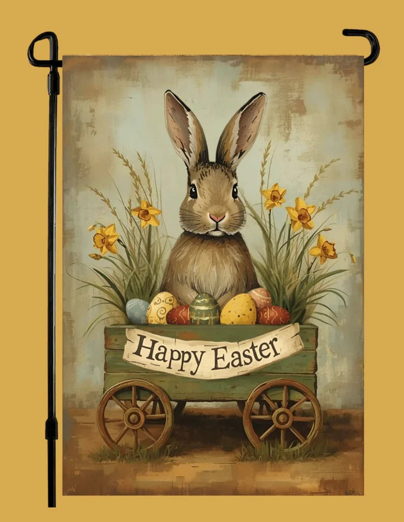 Decorative garden flag with a bunny and Easter eggs on a cart, featuring 'Happy Easter' text.
