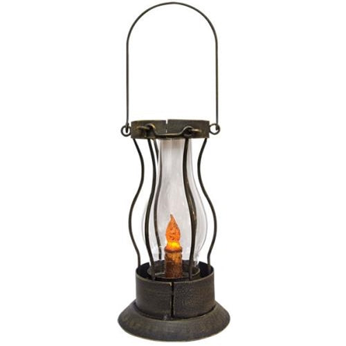 Decorative lantern with a candle inside on a white background