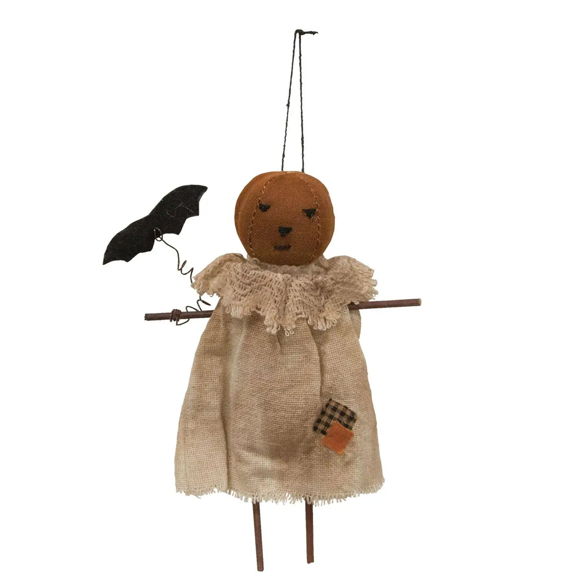 A rustic Halloween hanging doll made from burlap and wood, with a round pumpkin face, lace collar, black bat accessory, and wooden legs on a white background.