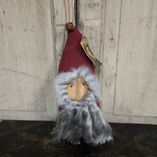 Small decorative figure on a wooden surface