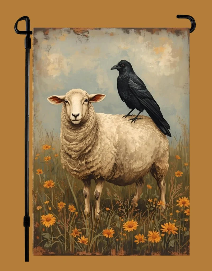 Decorative flag with a sheep and a crow in a field of flowers on a yellow background