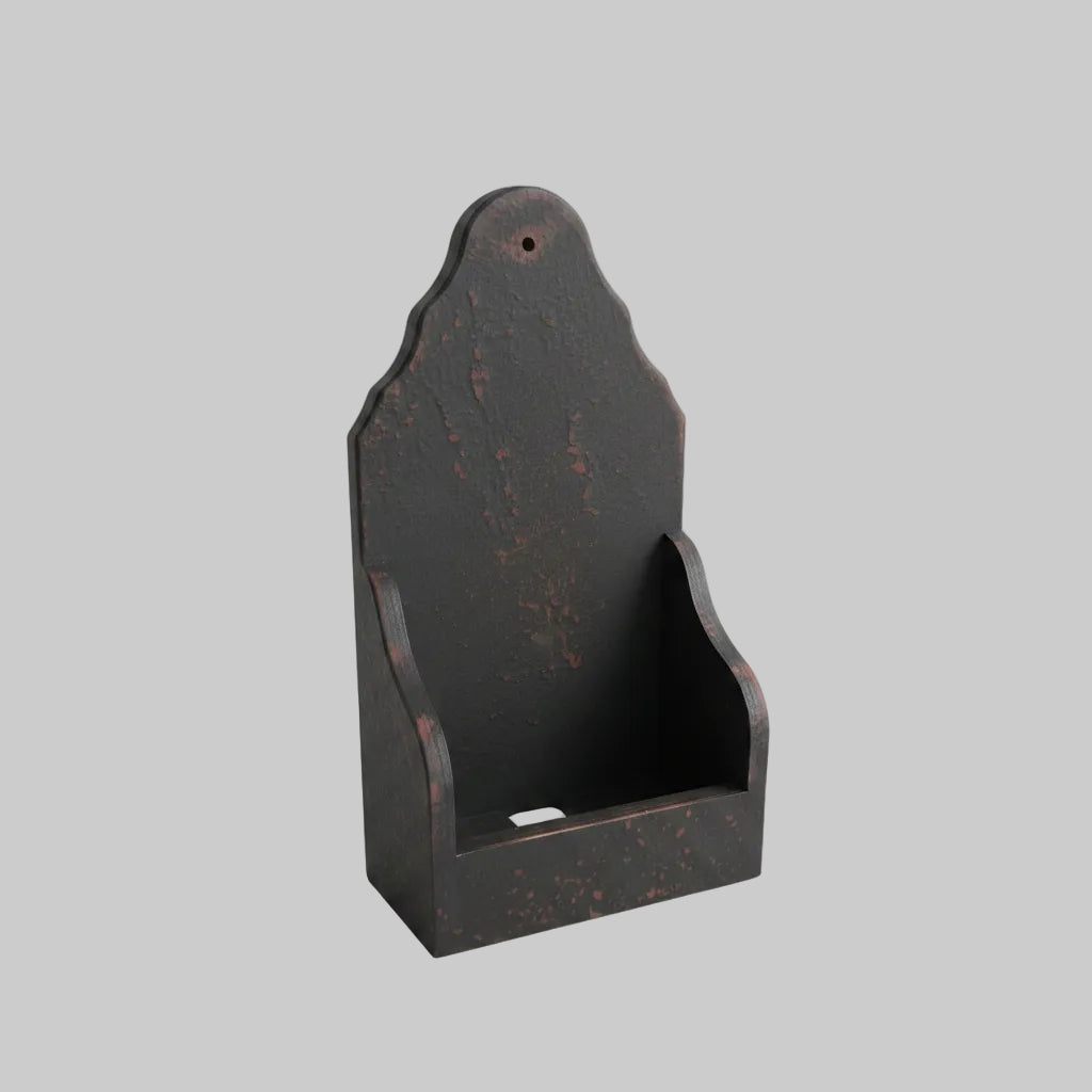 Black wooden sconce on a light gray background