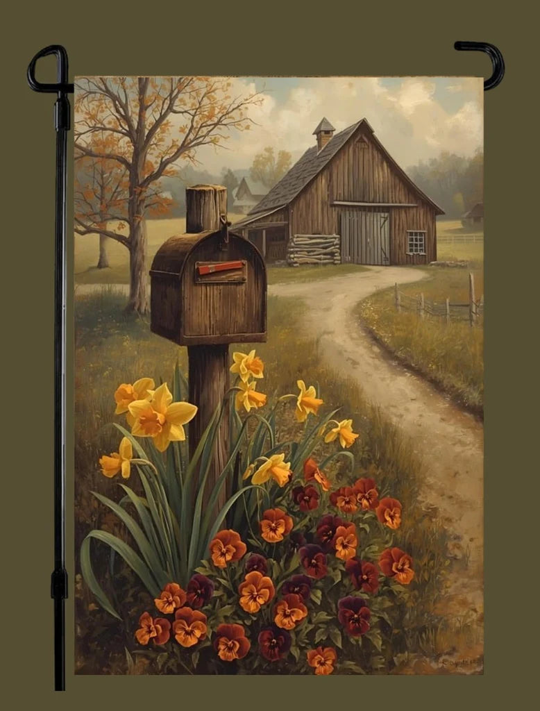 Decorative garden flag with a barn, mailbox, and flowers on a pole.
