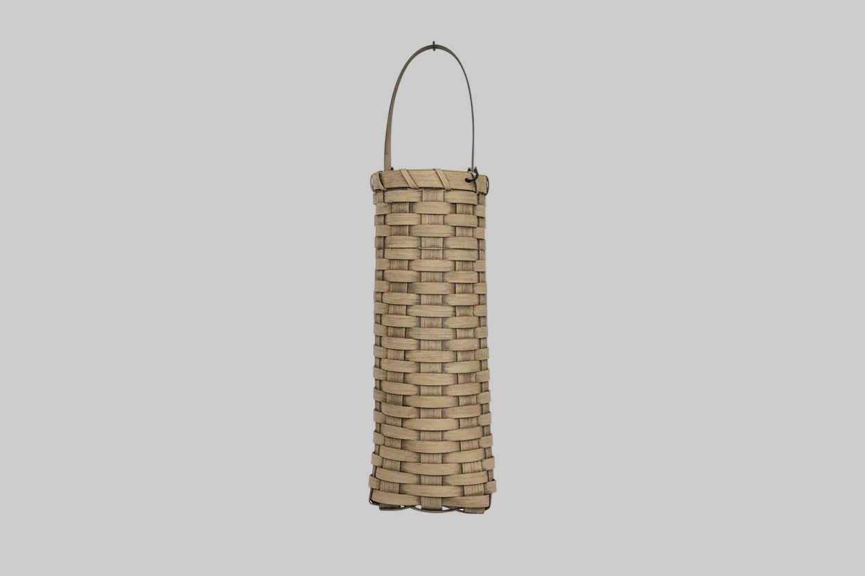 Woven basket on a wooden background