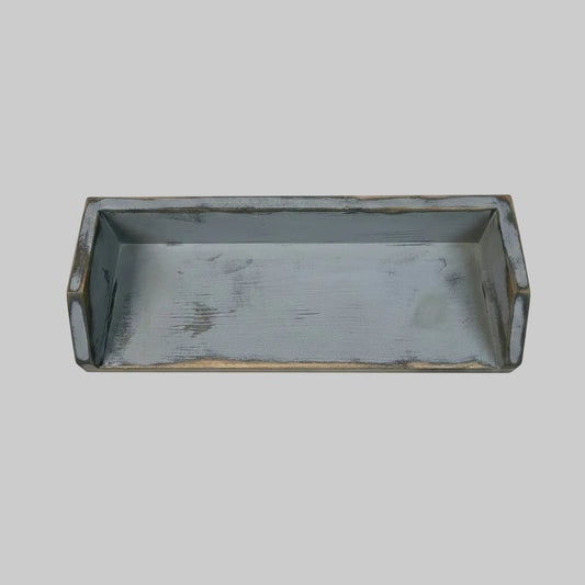 A rectangular gray tray with a raised rim, shown from above.