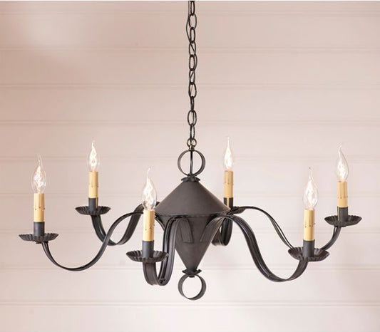 Black chandelier with six candle-style lights on a beige background