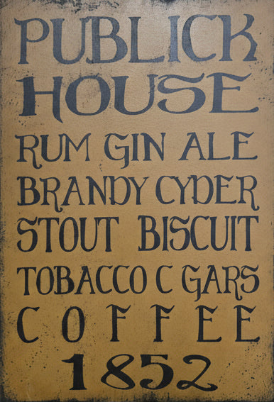 Wooden sign with text listing items and years on a wooden background