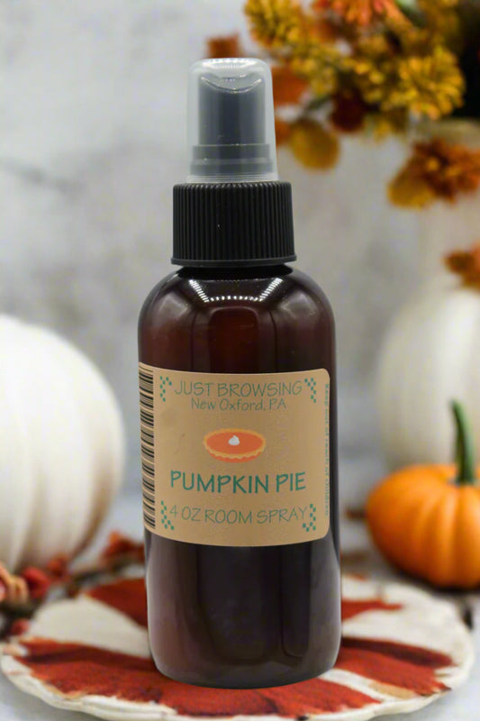 A 4oz bottle of Pumpkin Pie room spray with a mist spray top. The label features the product name and a brief description.