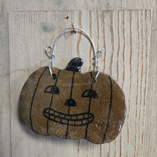 Ceramic pumpkin on a hanger