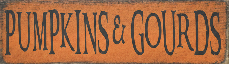 Wooden sign with 'Pumpkins & Gourds' text on a white background