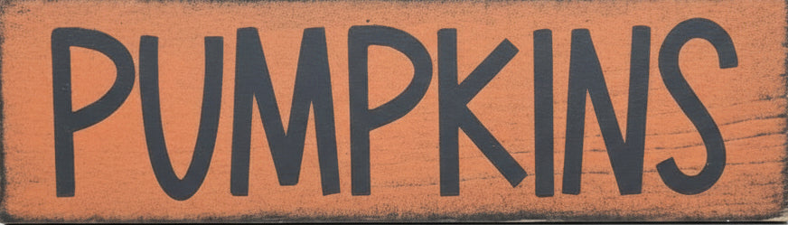 Wooden sign with 'Pumpkins' text on a orange background