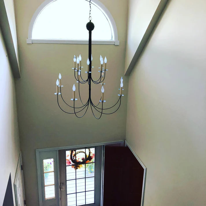 Two tier chandelier in grand foyer.