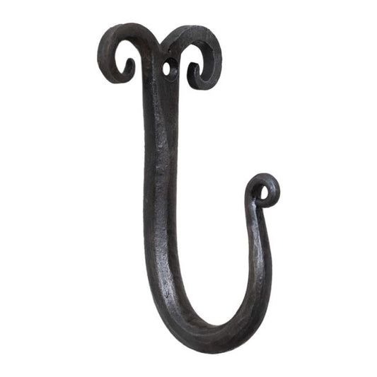 A black wrought iron wall hook with a curled top design.