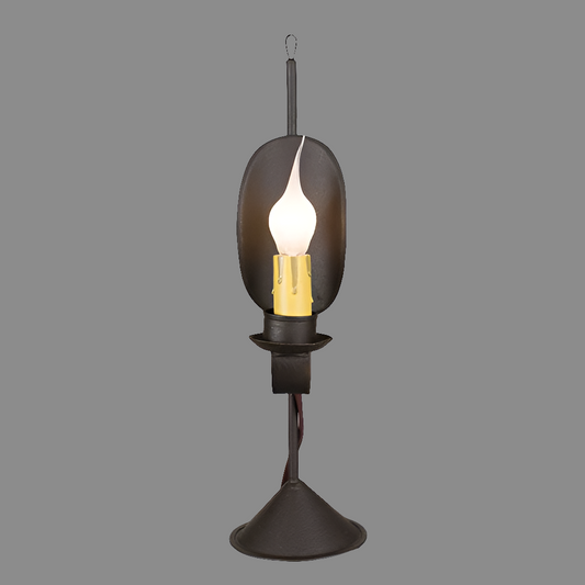 A black table lamp with a textured glass shade and a bronze-colored base, designed to stand on a flat surface.