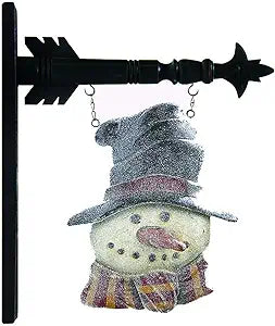 A resin glitter snowman in a top hat attached to an arrow replacement sign.