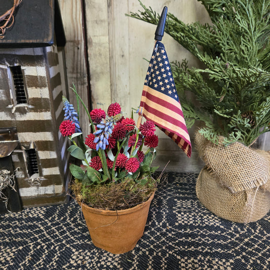 Flowers in Cinnamon Pot with Flag