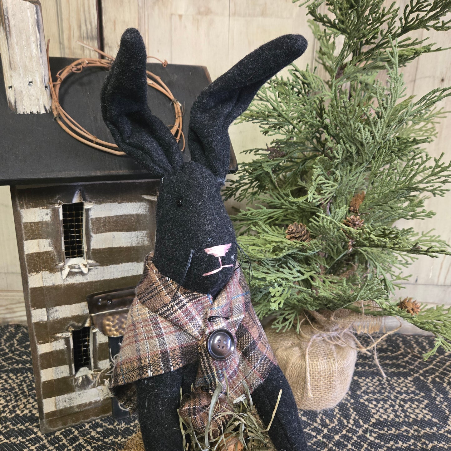 Primitive Black Bunny Holding Bag of Eggs