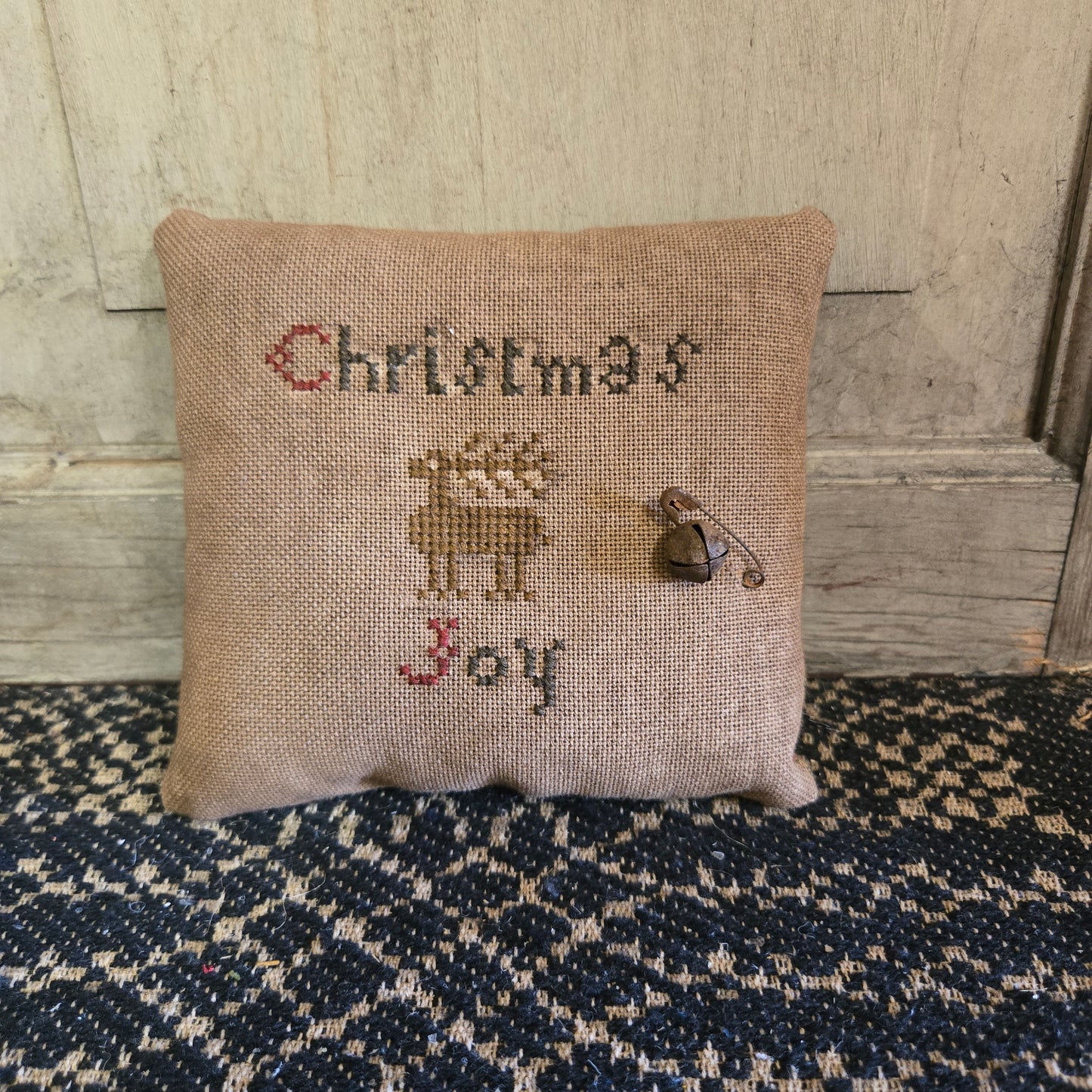 Collection of Primitive Christmas Cross Stitch Pillows