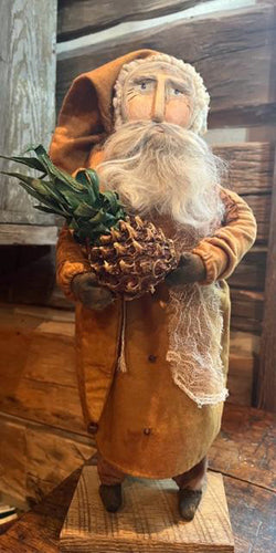 Primitive Santa with Clay Face Holding Pineapple