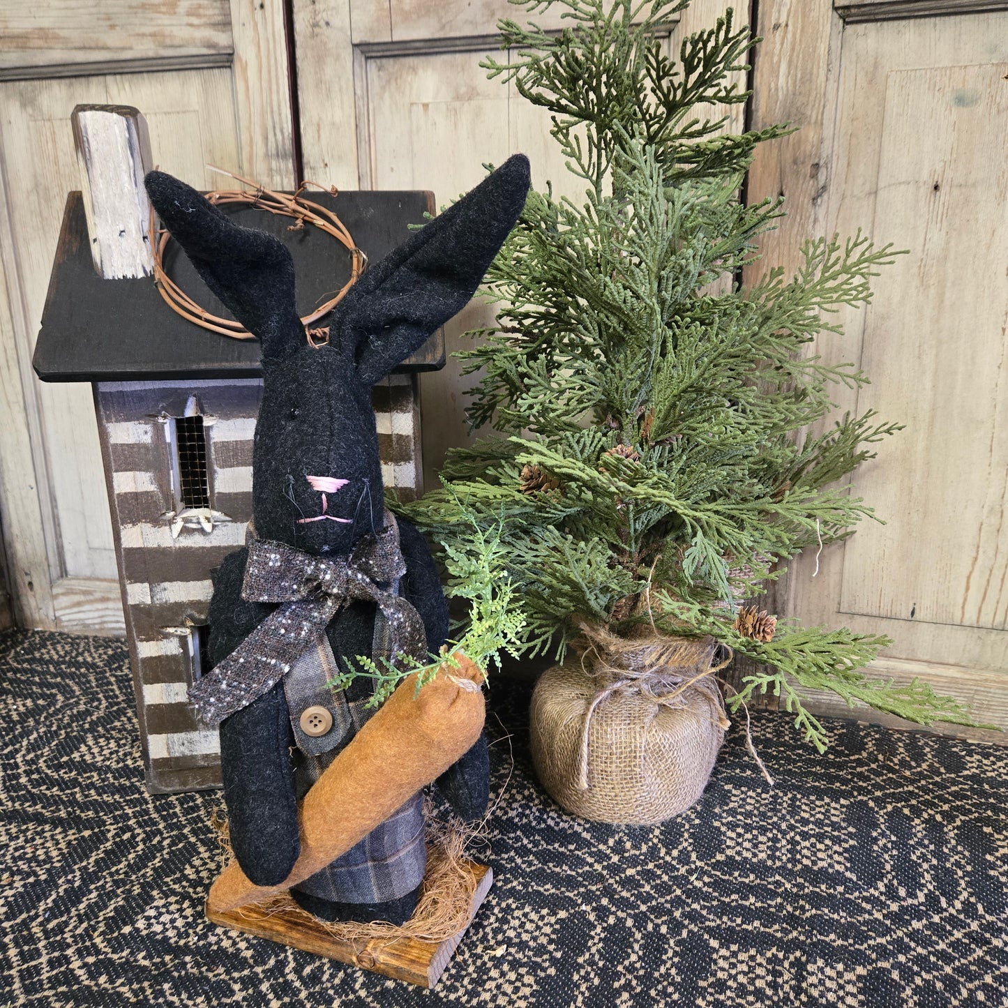 Primitive Black Bunny Holding Carrot