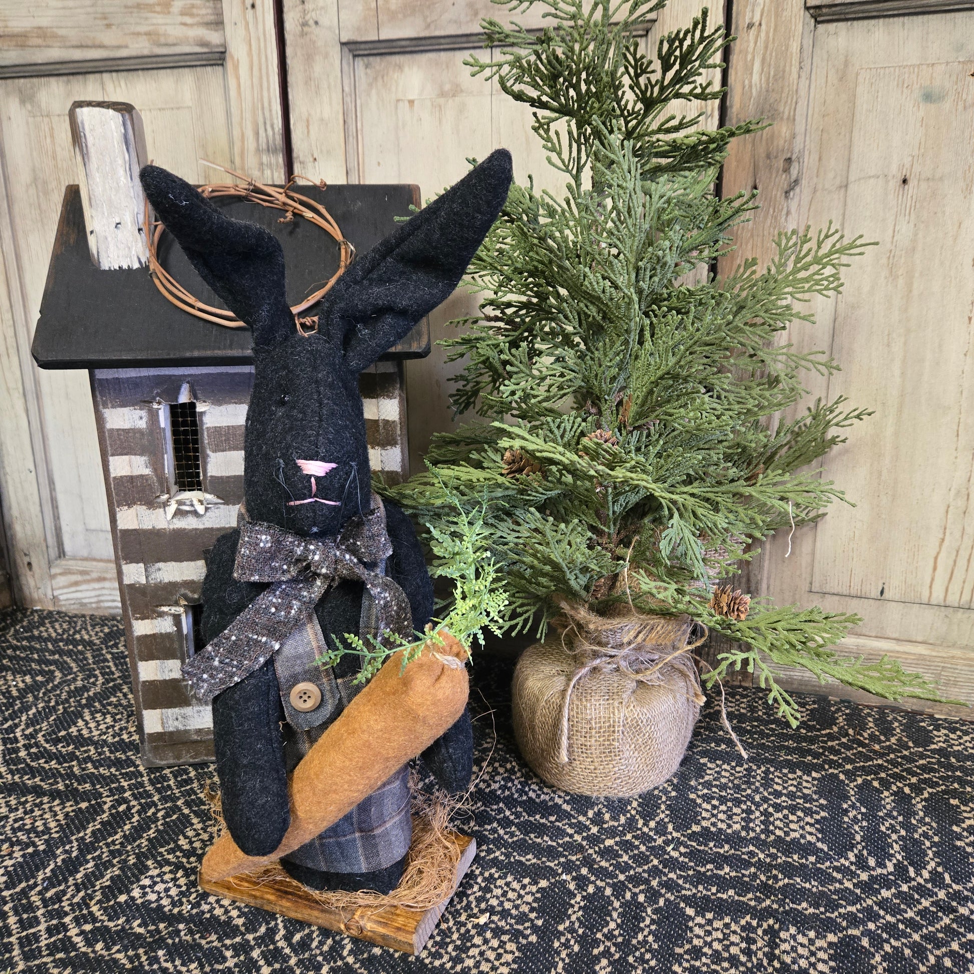 Primitive Black Bunny Holding Carrot