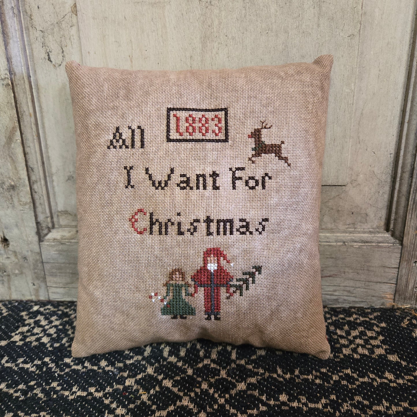 Collection of Primitive Christmas Cross Stitch Pillows
