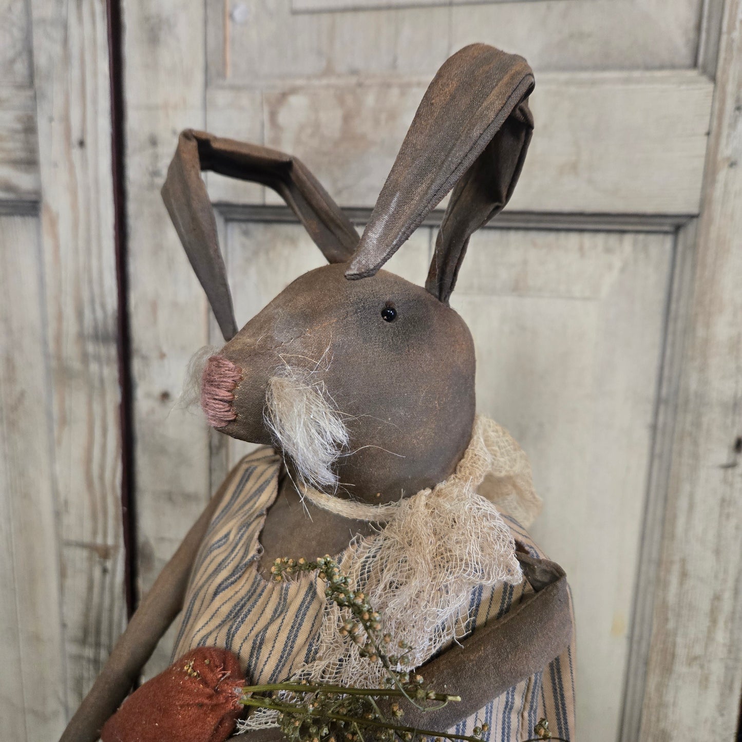 Primitive Bunny Holding Carrot