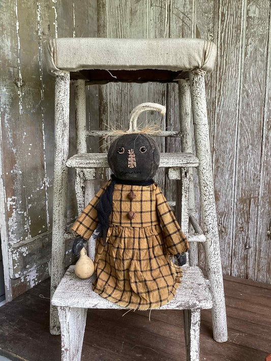 Black Head Pumpkin Doll Holding Gourd