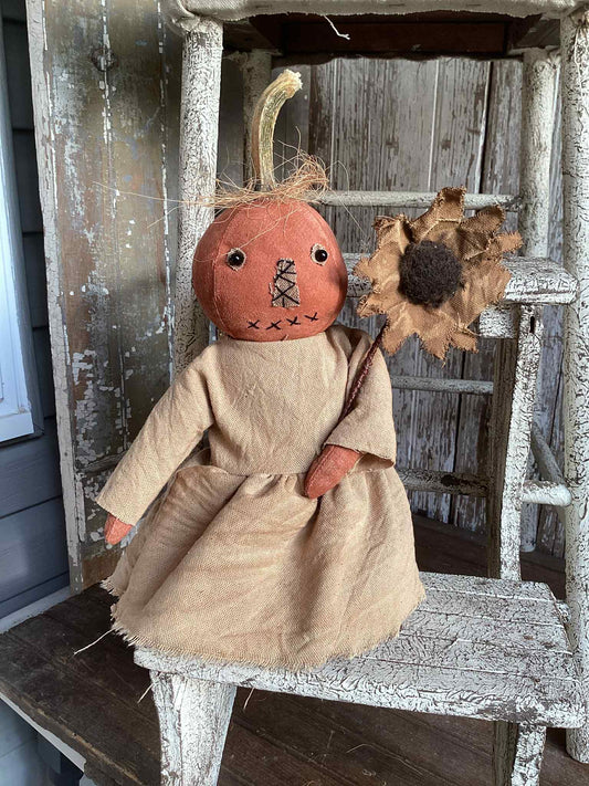 Orange Pumpkin Head Doll Holding Sunflower