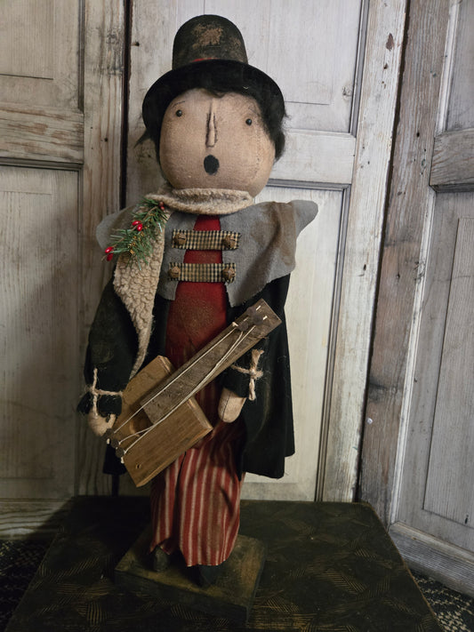 Primitive Caroler