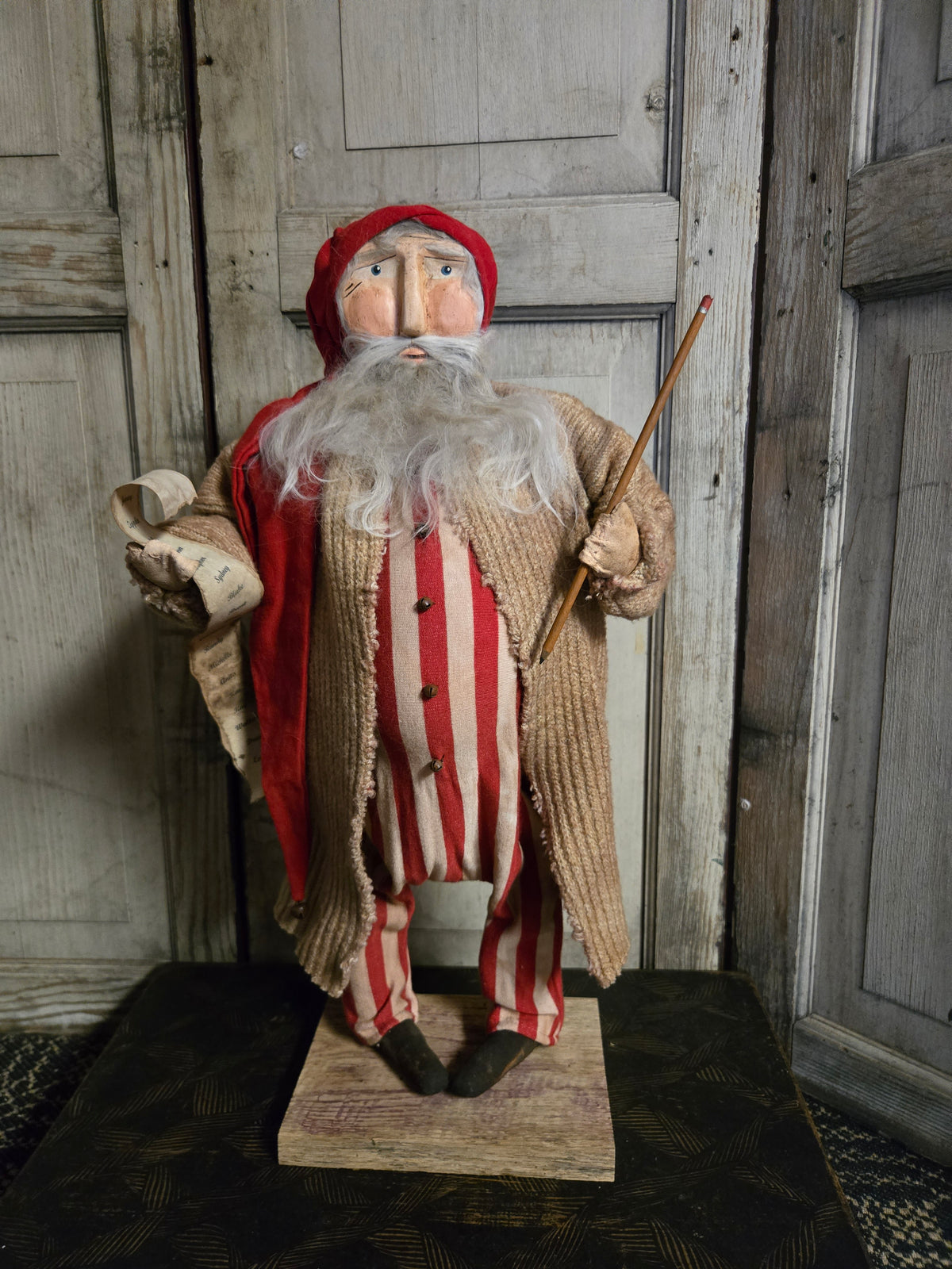 Primitive Clay Faced Santa with List