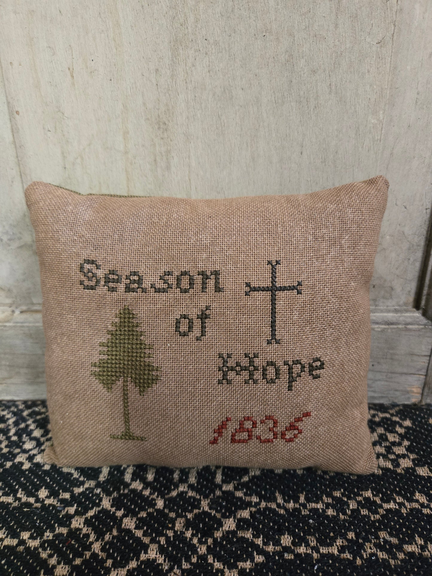 Collection of Primitive Christmas Cross Stitch Pillows