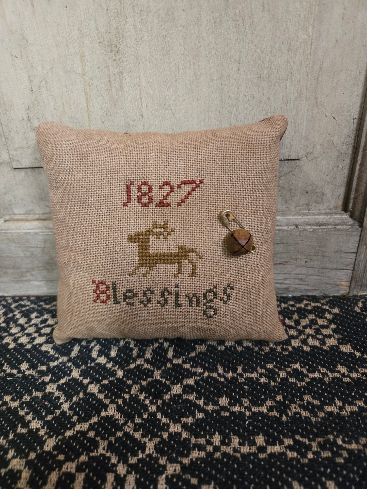 Collection of Primitive Christmas Cross Stitch Pillows