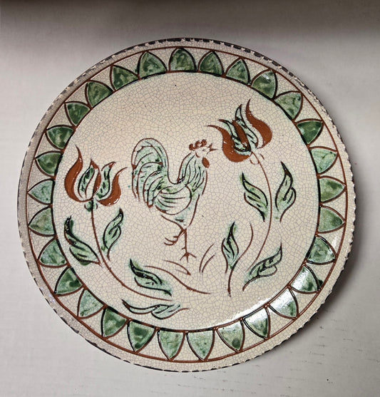 Yellow ware plate with a rooster and tulips and a unique border