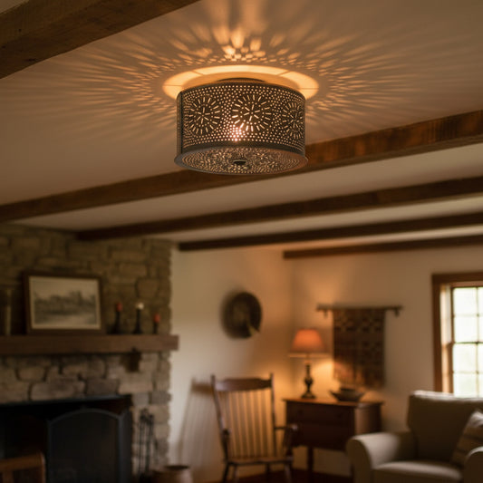 Decorative ceiling light fixture with intricate cut-out design on a white background
