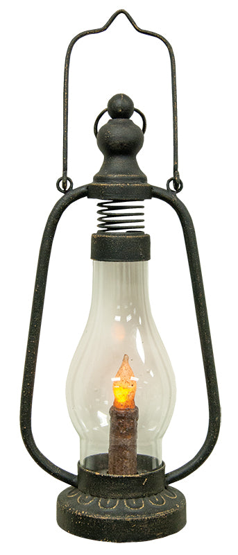 Vintage-style lantern with a glowing candle inside on a white background