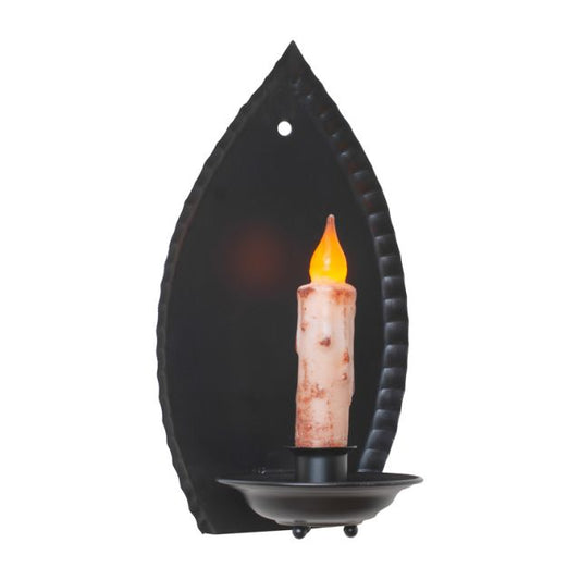 Black leaf-shaped wall sconce with a lit candle on a white background