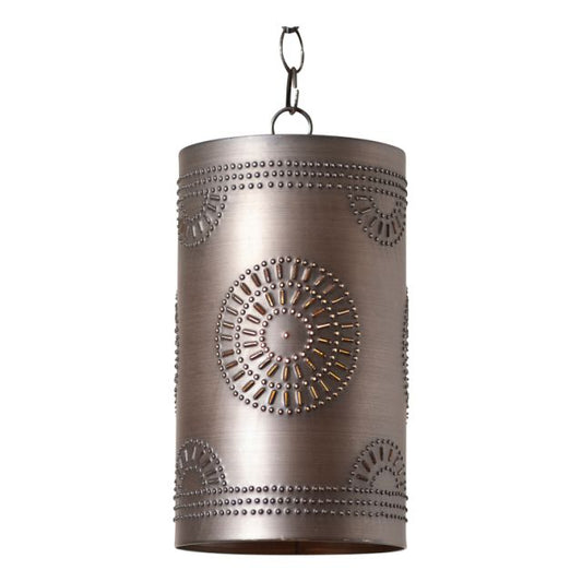 A rustic cylindrical black pendant light with a geometric pattern and a chain for hanging.