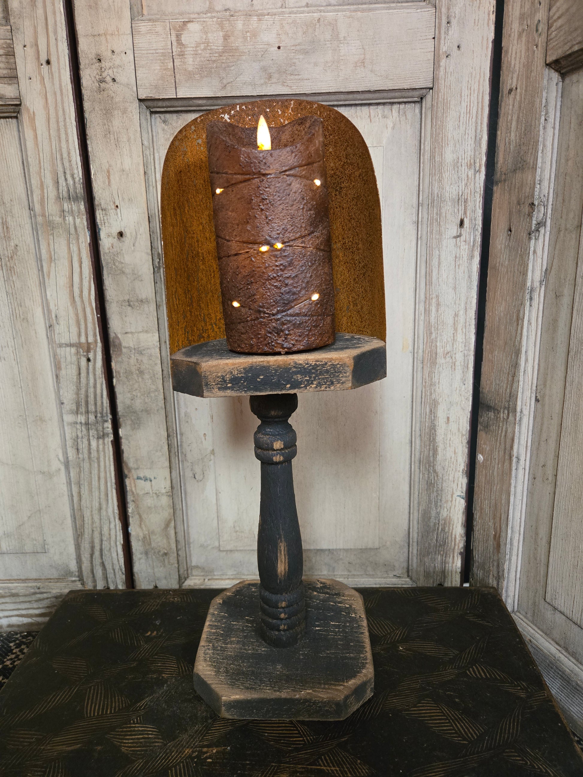 Wooden lamp with a rustic design on a wooden background