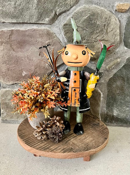 Decorative figure with a stone wall background