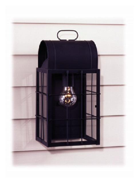 Black outdoor wall light fixture on a white siding background