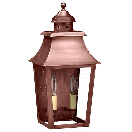 Copper outdoor lantern with two candle-like lights on a white background