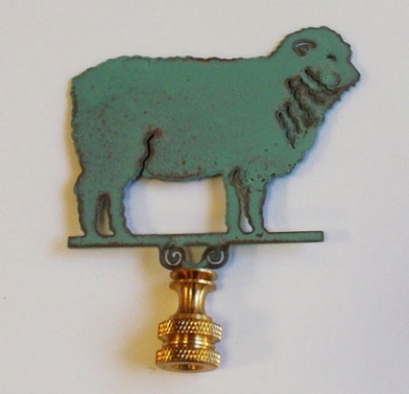 A copper lamp finial with a verdigris finish shaped like a sheep, featuring a gold-colored metal base.