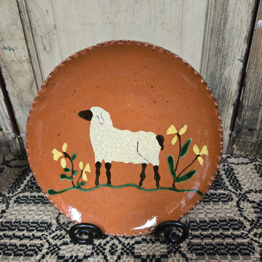 Redware plate with standing sheep and flowers