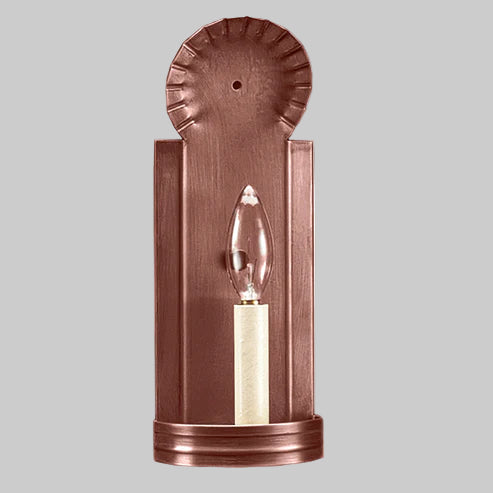 Copper wall sconce with a light bulb on a gray background