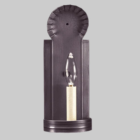 Wall-mounted light fixture with a decorative design on a gray background