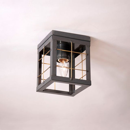 Modern ceiling light fixture with grid design on a white background