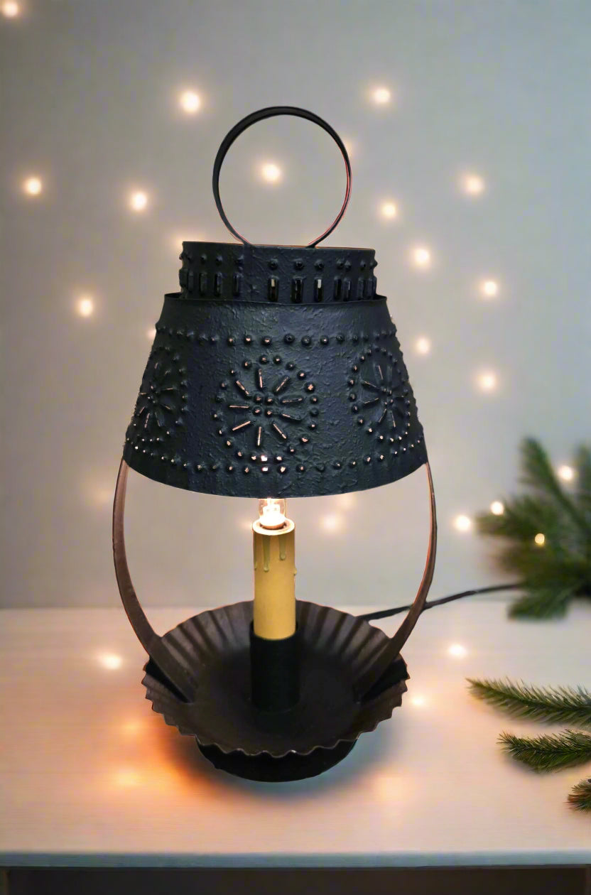 A textured black finished lamp with a cone-shaped shade, solid metal construction, and a visible incandescent bulb.