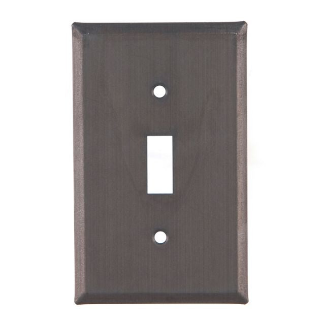 A single switch cover in a kettle black finish, made of metal with a matte lacquer protective coating, designed to fit over a switch on a wall plate.